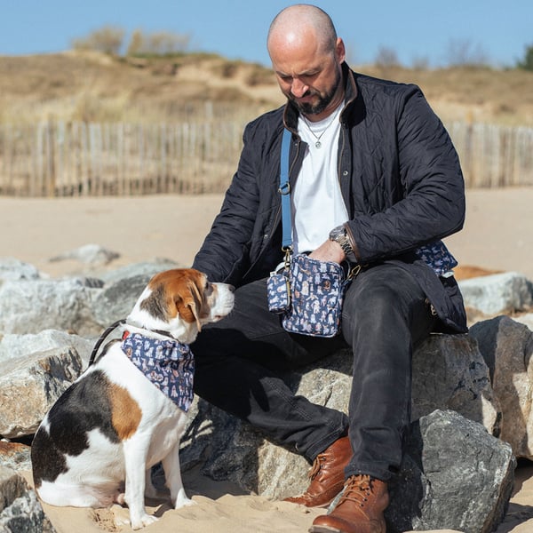 Ben and Jefferey using the dog walking bag by Wrendale Designs at the beach