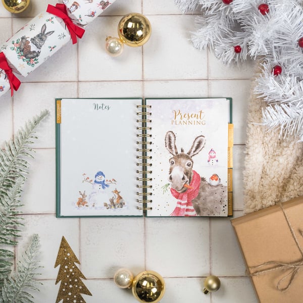An image of the present planning section of the Christmas planner by Wrendale Designs